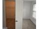 Bedroom view with a walk-in closet and window providing natural light at 547 Se Tufton Se Trl, Atlanta, GA 30354