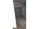 Spacious garage with gray metal door, concrete floor and ready for parking and storage at 547 Se Tufton Se Trl, Atlanta, GA 30354
