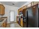 Cozy kitchen featuring black appliances and access to the back patio at 547 Se Tufton Se Trl, Atlanta, GA 30354