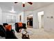 Spacious living room with comfortable seating, ceiling fan and neutral carpet at 547 Se Tufton Se Trl, Atlanta, GA 30354