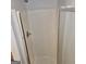 A modern shower with a glass door and chrome hardware at 547 Se Tufton Se Trl, Atlanta, GA 30354