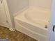 Close-up of a soaking tub, perfect for relaxation and a spa-like experience at 547 Se Tufton Se Trl, Atlanta, GA 30354