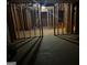 The unfinished basement boasts open stud framing, offering potential for customization at 10937 Southwood Dr, Hampton, GA 30228