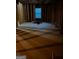 The unfinished basement boasts open stud framing, offering potential for customization at 10937 Southwood Dr, Hampton, GA 30228
