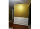 Entryway with gold paint and wood floors at 10937 Southwood Dr, Hampton, GA 30228