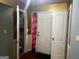 The entryway features a white front door, a storm door, and coat closet at 10937 Southwood Dr, Hampton, GA 30228