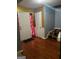 Entryway to home showing closet, front door, and staircase at 10937 Southwood Dr, Hampton, GA 30228