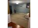 Open living room with carpet floors at 10937 Southwood Dr, Hampton, GA 30228