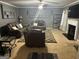 Living room with stylish furnishings and carpet at 10937 Southwood Dr, Hampton, GA 30228