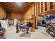 Spacious garage featuring a car lift and ample storage, perfect for hobbyists at 228 Indian Creek Rd, Locust Grove, GA 30248