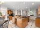 Spacious kitchen with granite countertops, wine rack and island perfect for entertaining and cooking at 228 Indian Creek Rd, Locust Grove, GA 30248