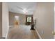 Neutral-toned living room boasts hardwood floors and ample natural light, plus built in desk area at 228 Indian Creek Rd, Locust Grove, GA 30248