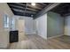 Finished basement with open ceiling, offering additional living space for recreation or storage at 2673 Deerfield Sw Cir, Marietta, GA 30064