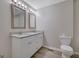 Bathroom vanity with double sinks and granite countertop, offering plenty of space and style at 2673 Deerfield Sw Cir, Marietta, GA 30064