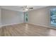 Spacious bedroom featuring light tone walls and floors, and natural light from windows at 2673 Deerfield Sw Cir, Marietta, GA 30064