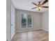 Bright bedroom featuring light-tone walls, fan with lights and natural light from windows at 2673 Deerfield Sw Cir, Marietta, GA 30064