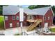 Spacious backyard featuring a wooden deck, a patio area, and mature landscaping at 1118 Sequoia Trl, Mcdonough, GA 30252