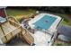 Elevated shot of a deck and covered pool in a landscaped backyard at 1118 Sequoia Trl, Mcdonough, GA 30252