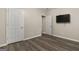 Bedroom features luxury vinyl flooring and fresh neutral paint, ready for your personal touch at 1118 Sequoia Trl, Mcdonough, GA 30252