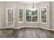 Charming dining area with bay window, natural light, and access to outdoor deck at 1118 Sequoia Trl, Mcdonough, GA 30252