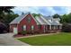 Lovely red brick home with an attached garage and meticulously maintained landscape at 1118 Sequoia Trl, Mcdonough, GA 30252