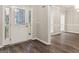 Inviting foyer featuring a decorative front door, wood flooring and neutral color palette at 1118 Sequoia Trl, Mcdonough, GA 30252