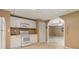 An efficient kitchenette flows into a living space, showcasing the possibilities of the layout at 1118 Sequoia Trl, Mcdonough, GA 30252