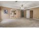 Open-concept living area with kitchenette access, ideal for entertaining or relaxation at 1118 Sequoia Trl, Mcdonough, GA 30252