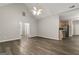 Open-concept living room that leads to the kitchen with stainless steel appliances at 1118 Sequoia Trl, Mcdonough, GA 30252