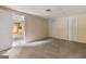 A spacious living area leads to a kitchenette, offering seamless flow and functionality at 1118 Sequoia Trl, Mcdonough, GA 30252