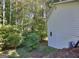 Back exterior of house featuring green foliage at 2066 Tidwell Trl, Stone Mountain, GA 30088