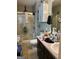 Full bathroom with glass shower, vanity, and a collection of toiletries at 1137 Eagles Nest Cir, Carrollton, GA 30116