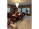 Spacious dining room featuring a chandelier and a large dining table set for a meal at 1137 Eagles Nest Cir, Carrollton, GA 30116