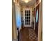 Inviting entryway with hardwood floors, decorative rug, and stylish accents at 1137 Eagles Nest Cir, Carrollton, GA 30116