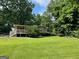 Charming home with a inviting front porch and well-manicured lawn at 1170 5Th Ave, Jonesboro, GA 30236