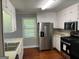 Bright kitchen featuring white cabinets, stainless steel appliances, and ample counter space at 1170 5Th Ave, Jonesboro, GA 30236