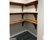 Pantry with custom shelving and unique flooring, offering ample storage space at 1170 5Th Ave, Jonesboro, GA 30236