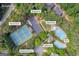 Aerial shot showcasing community amenities: playground, tennis and basketball courts, pool, splash pad, and clubhouse at 770 River Cove Dr, Dacula, GA 30019
