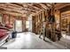 Unfinished basement featuring exposed framing and concrete flooring at 770 River Cove Dr, Dacula, GA 30019