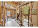 Unfinished basement with workout equipment and concrete walls at 770 River Cove Dr, Dacula, GA 30019