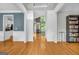 Spacious living room with hardwood floors and an open layout flowing into other rooms at 770 River Cove Dr, Dacula, GA 30019
