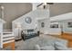 Open concept living room boasts high ceilings and hardwood floors throughout at 770 River Cove Dr, Dacula, GA 30019