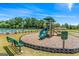 Well-maintained community playground with a slide and climbing structure, ideal for recreation at 600 Dairy Dr, Stockbridge, GA 30281