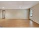 Large finished basement features wood floors and a back door at 323 Newfield Way, Peachtree City, GA 30269