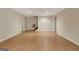 Basement featuring wood floors and additional storage space at 323 Newfield Way, Peachtree City, GA 30269