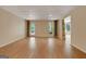 The open basement has recessed lighting and wood floors at 323 Newfield Way, Peachtree City, GA 30269