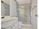 Bathroom featuring a vanity with mirror, a shower, and tile floors at 323 Newfield Way, Peachtree City, GA 30269