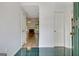 Inviting foyer with tile and wood flooring that transitions into a spacious living area at 323 Newfield Way, Peachtree City, GA 30269