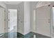 Foyer featuring tiled floors, an exterior door, and an interior door to other rooms at 323 Newfield Way, Peachtree City, GA 30269