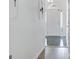 Bright hallway featuring tile flooring and leading to a naturally illuminated front entrance at 323 Newfield Way, Peachtree City, GA 30269